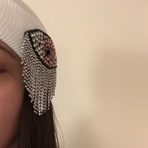 Elegant White Beanie with Rhinestone Eye Accent